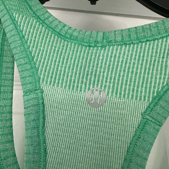 Lululemon - two tops- price is for the two. Teal V-Neck Top and Green tank top - Picture 7 of 8